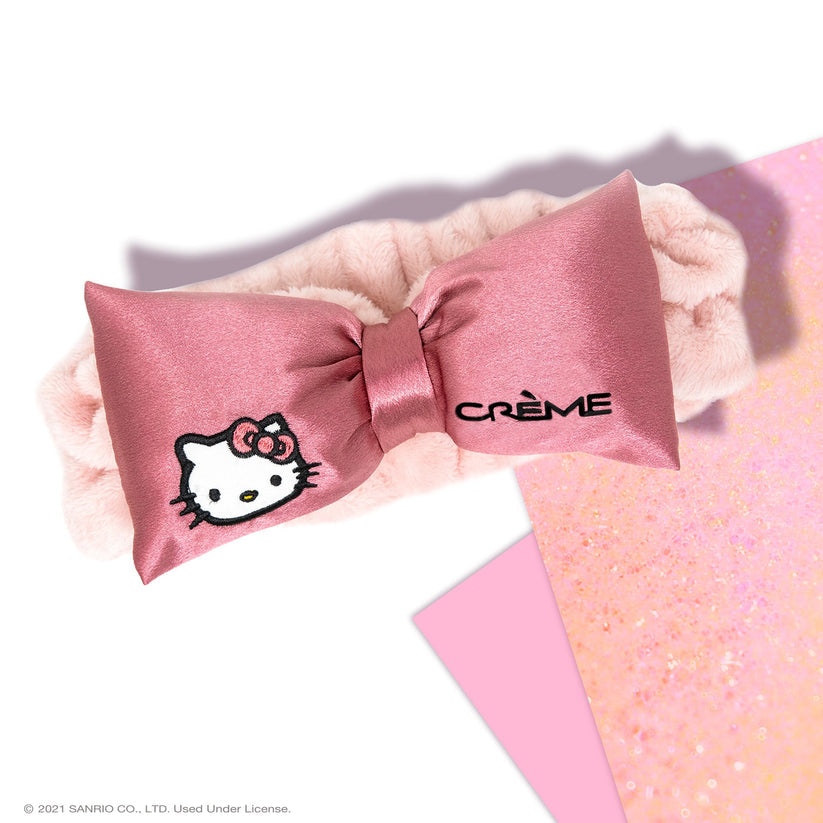 Hello Kitty makeup bag, press on nails, shops sleep mask, spa headband